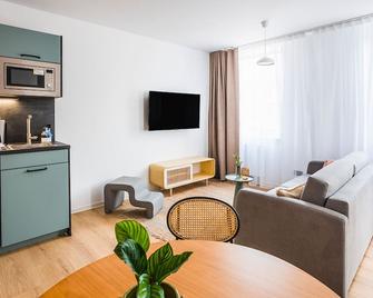 limehome Villach Hauptplatz - Villach - Pokój dzienny