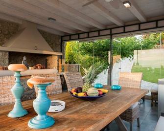 Porto Cheli Studio - Poolside Lux Getaway - Porto Cheli - Patio