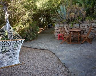 Casa Heiner and Fee vacation apartment by the sea with kayaks; - San Teodoro - Patio