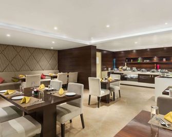 Ramada Encore by Wyndham Bangalore Domlur - באנגאלור - מסעדה