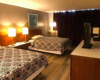 Western Inn - Houston - Bedroom