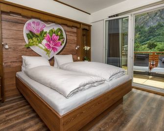 dala Hotel & Apartments - Leukerbad - Quarto