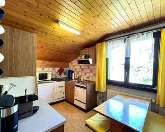 Attic apartment with fantastic mountain views for 1-4 people - St. Niklaus - Kitchen