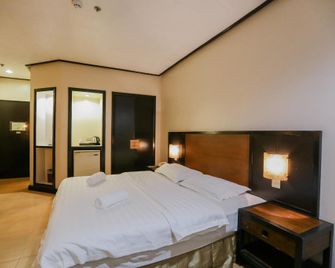 Business Inn - Bacolod - Bedroom