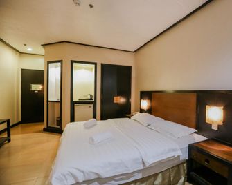 Business Inn - Bacólod - Habitación