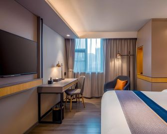 Home Inn Style Kunming Nanping Pedestrian Street Baoshan - 쿤밍 - 침실