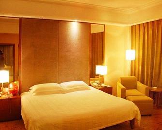 Hawaii International Hotel - Mudanjiang - Bedroom