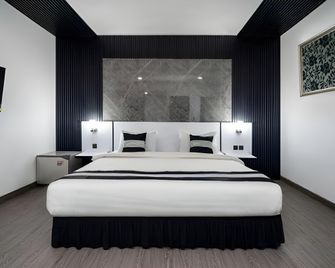 Jl Star Hotel Panakkukang Makassar By Life - מקאסר - חדר שינה