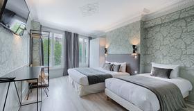 Hôtel Avama Prony - Paris - Bedroom