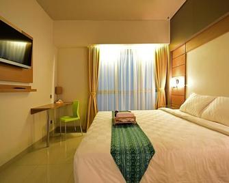 Montana Hotel Syariah Banjarbaru - Banjarbaru - Camera da letto