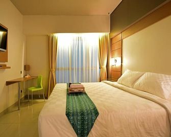 Montana Hotel Syariah Banjarbaru - Banjarbaru - Schlafzimmer