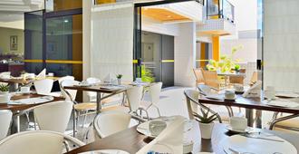 Plaza Inn Flat Araxa - Araxa - Restaurant