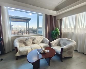 Jinjiang Inn Weihai High Speed Rail Station South Haibin Road Branch - Weihai - Wohnzimmer