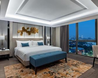 Royal Malioboro Yogyakarta by Aston - Yogyakarta - Bedroom