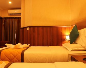 Hotel Empire International - Koramangala - Bengaluru - Bedroom
