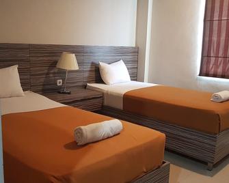 Miracle Hotel Manado - Manado - Bedroom