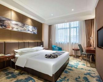 Jinjiang Metropolo Hotel Nanjing South Station Baijia Lake - Nanjing - Bedroom