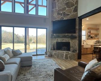 Retreat to the trees with this luxury cabin nestled in the woods - Madill
