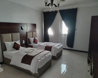 Al Eairy Apartments Madinah 9 - Medina - Slaapkamer