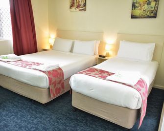 International Lodge Motel - מאקאי - חדר שינה