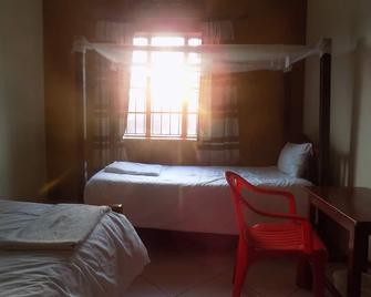 Hotel Park House - Ishaka - Habitación
