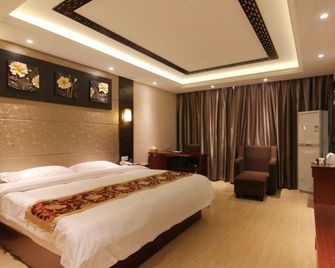 Greentree Inn Zhenjiang Jurong Yalong Business Hotel - Zhenjiang - Habitación
