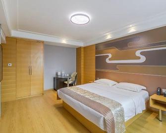 Yantai Tonghui Hotel - Yantai - Bedroom