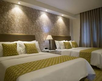 Sola Hotel - Laoag - Habitación