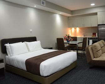 Ratsun Nadi Airport Apartment Hotel - Nadi - Bedroom