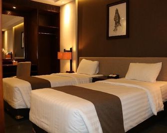 Tanjung Plaza Hotel - Prigen - Schlafzimmer