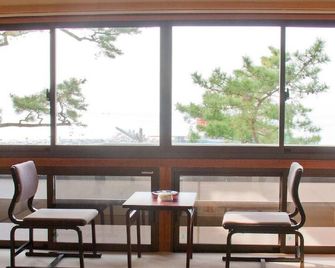 Nisshokan Hotel - איסה - חדר שינה