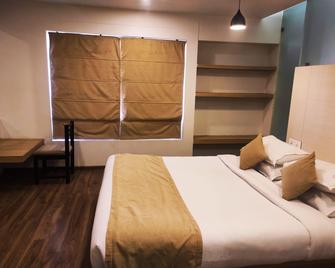 Hotel Rasika - Kolhapur - Camera da letto