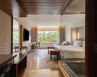 Temple Tree Hotel Shirdi, a member of Radisson Individuals - Shirdi - Bedroom