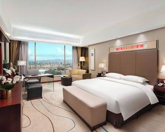 Royal Garden Hotel - Dongguan - Schlafzimmer
