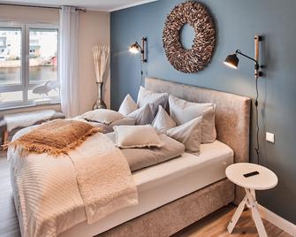 Seeloft - Boutique Apartments Am See - Petersberg - Habitación
