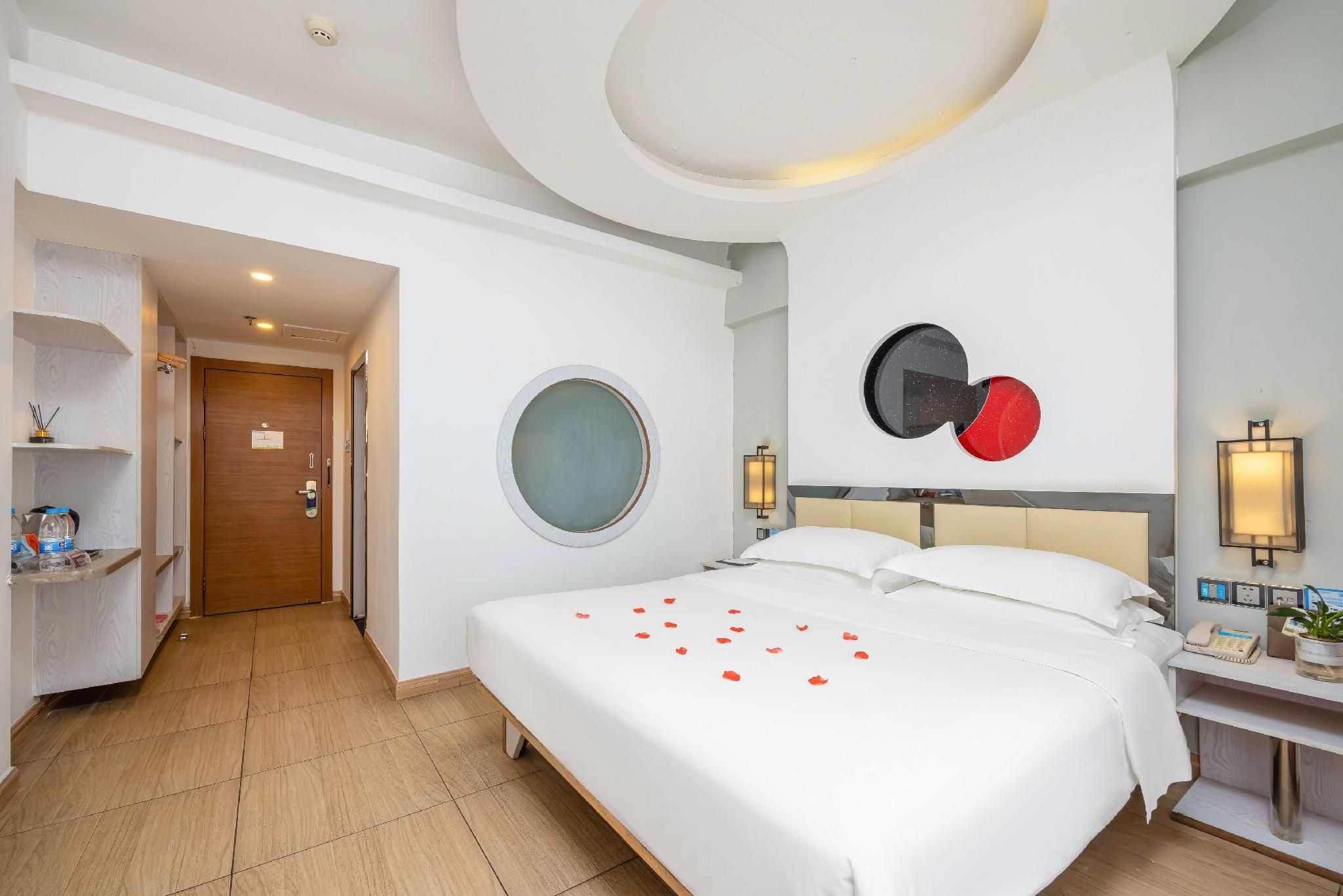 Jiajie Boutique Hotel (Haikou Qilou Old Street Sun Moon Plaza Duty Free Shop) - האיקואו - חדר שינה