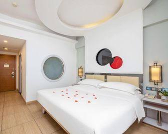 Jiajie Boutique Hotel (Haikou Qilou Old Street Sun Moon Plaza Duty Free Shop) - Haikou - Bedroom
