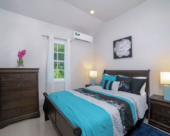 Elegant 1-bedroom apartment with AC and WiFi in Pleasant Buckleys - Buckleys - Bedroom