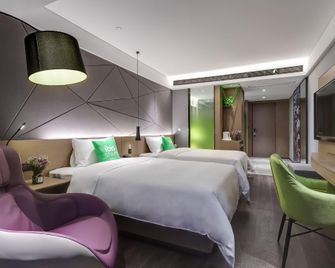ibis Styles Nanjing South Railway Station North Square Hotel - נאנז'ינג - חדר שינה