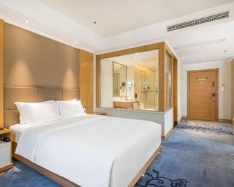 Jindu Lanhai Junhua Hotel (Xuzhou Feng County Feilong Lake) - Xuzhou - Bedroom