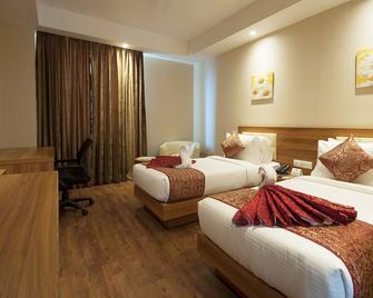 Hotel Le Roi Haridwar @ Har Ki Pauri Road - Haridwar - Schlafzimmer