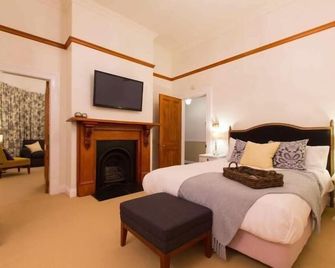 هوسكينج هاوس - نيو بليموث - غرفة نوم