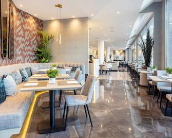 هوتل إيليونيون ألكالا نورت - مدريد - مطعم