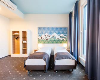 B&B Hotel Rosenheim - Rosenheim - Camera da letto