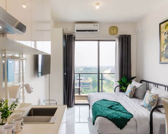 Arka by TwoSpaces Studio @Skyhouse Apartment - Tangerang City - Bedroom