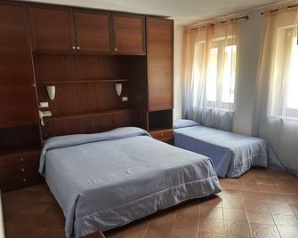 Hotel Alla città di Trieste - גראדו - חדר שינה