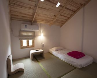 Zen Box House - Guilin - Schlafzimmer