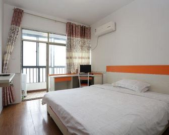 Yasite Hotel - Qinzhou - Bedroom