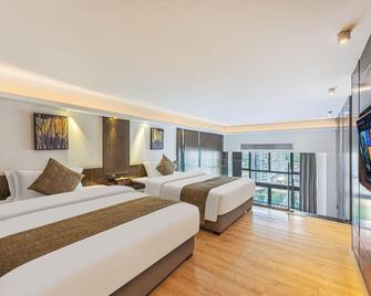 Okay Apartment (Guangzhou Hanxi Changlong Metro Station) - Cantón - Habitación
