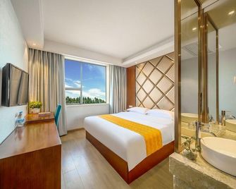 Xinyuan Business Hotel - Xiangyang - Bedroom